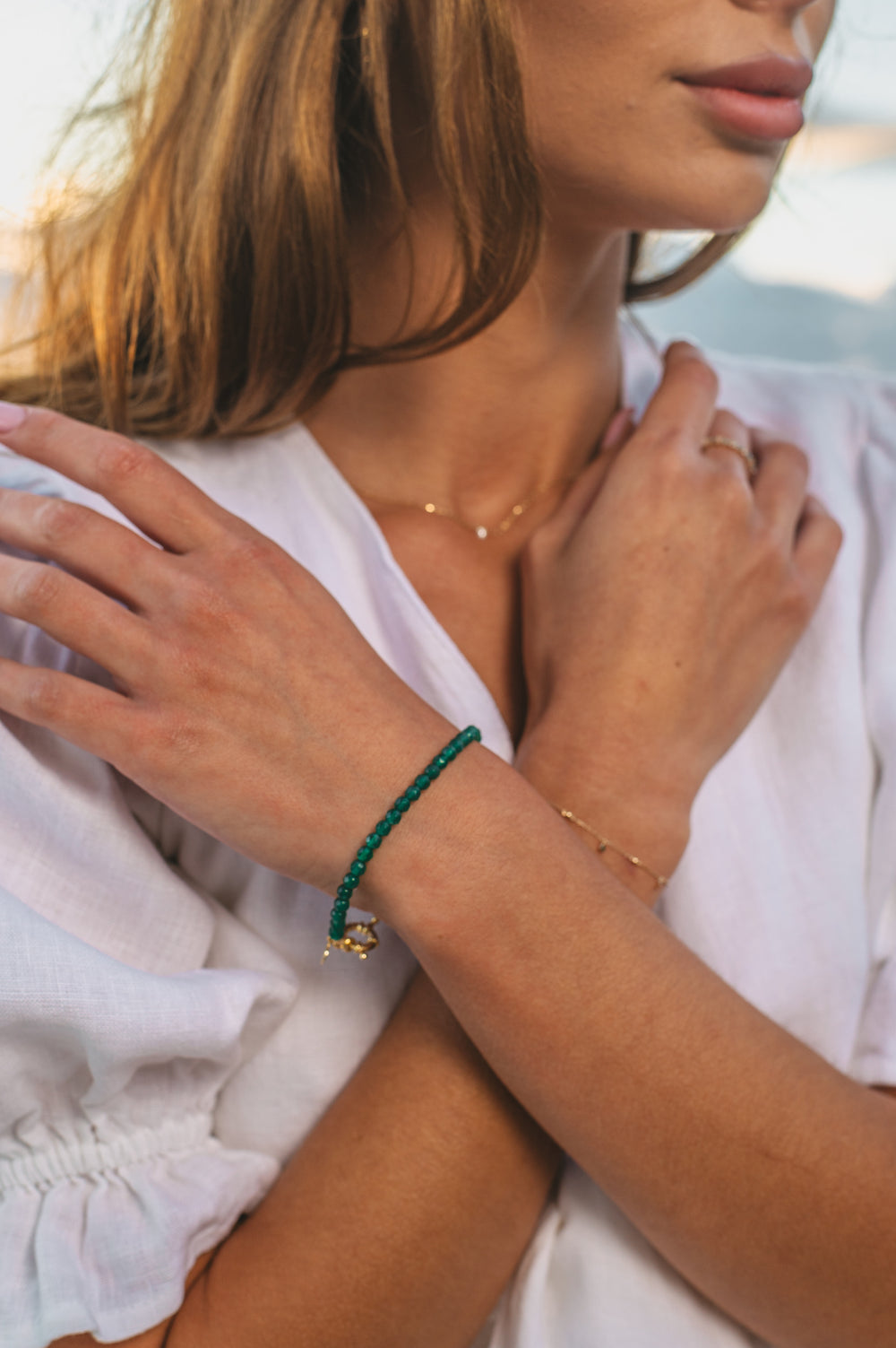 Green Natural Stone Bracelet on model at beach