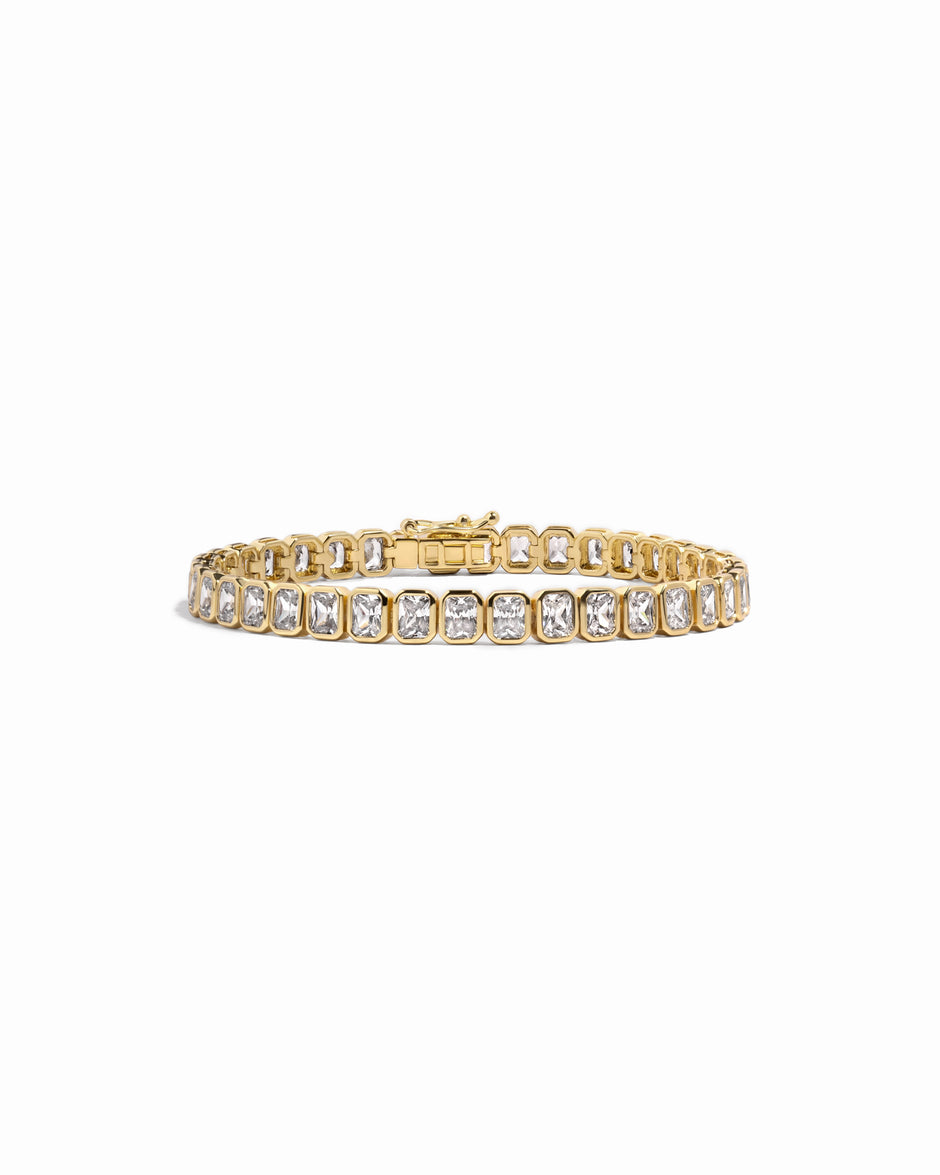 Gold emerald-cut CZ tennis bracelet by Olivia Lorèn The Label